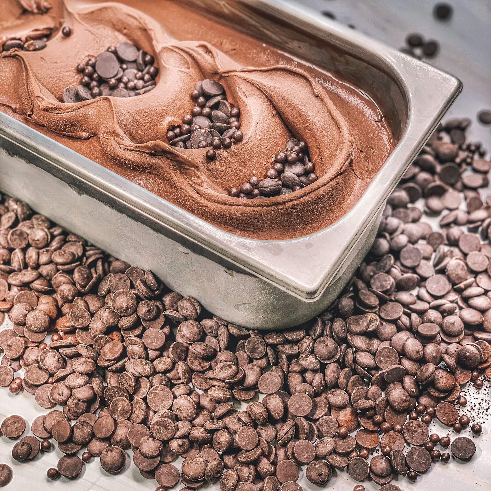 Dark Chocolate gelato ice cream in a Napoli tub container Cremoloso Gelato